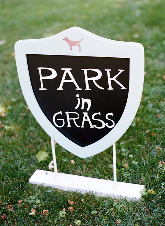 park in grass sign