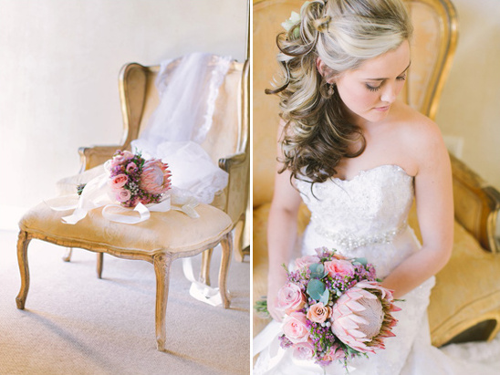 Elegant bride with bouquet, veil on chair, ready for her wedding