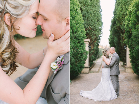 Wedding couple sharing a tender moment near the trees