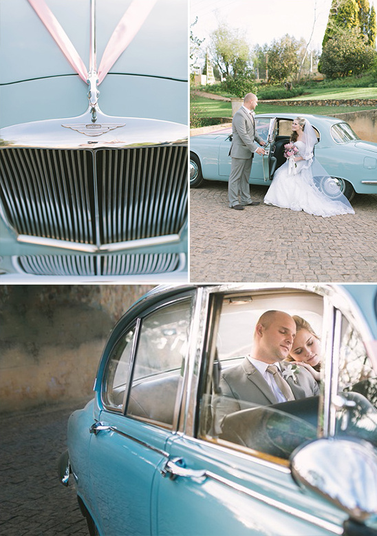 Wedding day details with bride, groom and blue vintage car