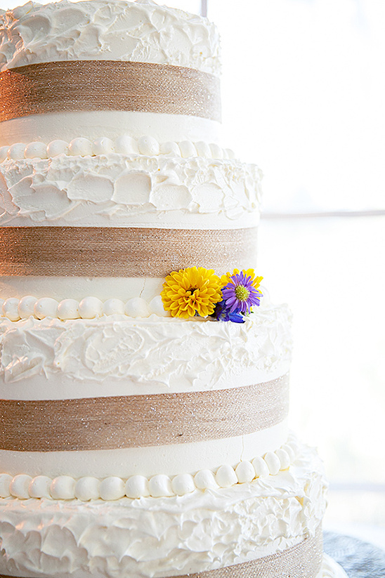 burlap wrapped white wedding cake