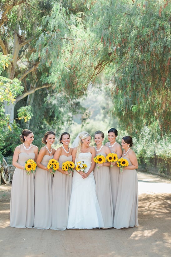 tan bridesmaids dresses with sunflowers