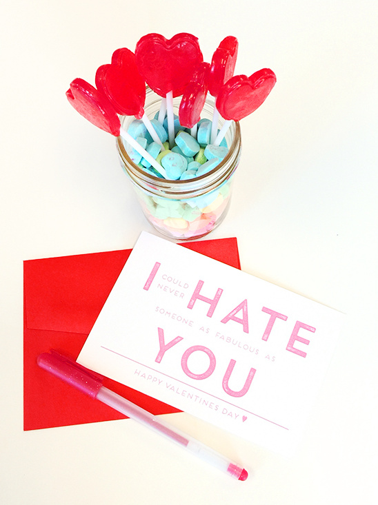 Valentines Day card with lollipops and candy jar