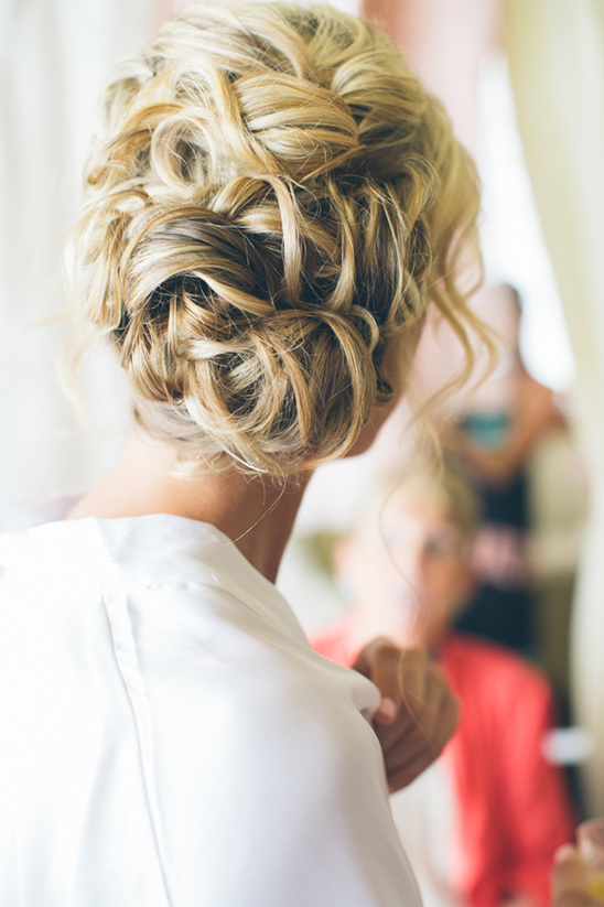 Elegant blonde updo hairstyle for a special occasion