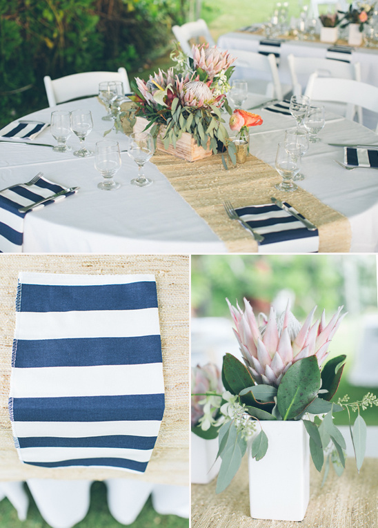 Elegant table setting with floral centerpiece and striped napkins
