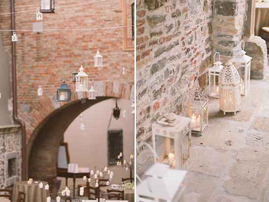 Rustic outdoor wedding reception with glowing lanterns