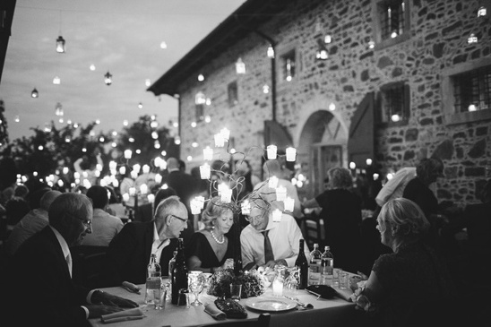 Elegant black and white outdoor wedding reception scene