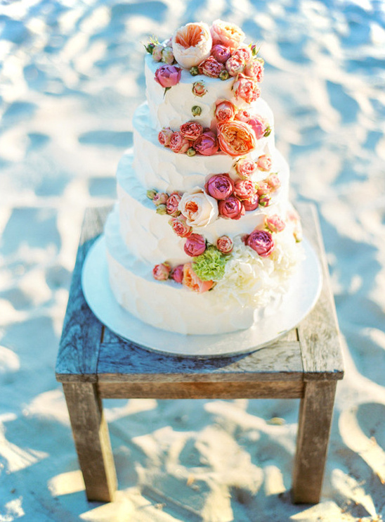 garden rose topped wedding cake