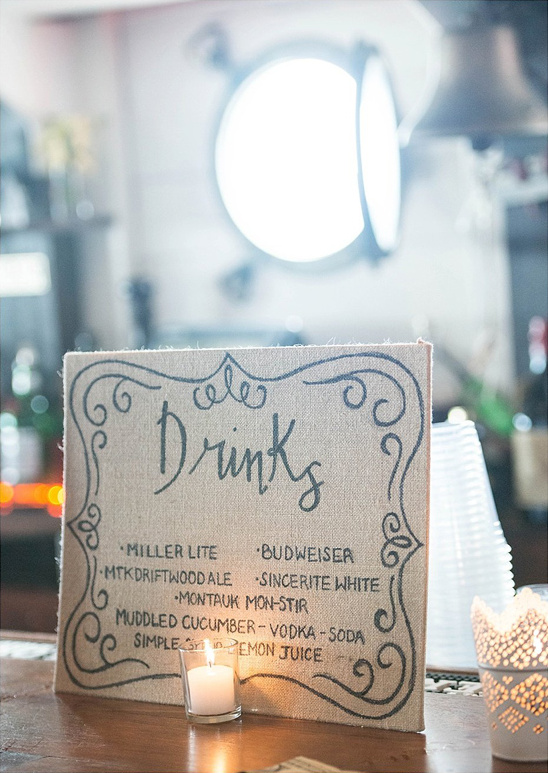burlap covered hand written drink menu