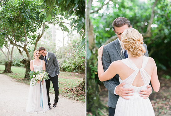 Elegant bride and groom embrace in a beautiful outdoor wedding scene
