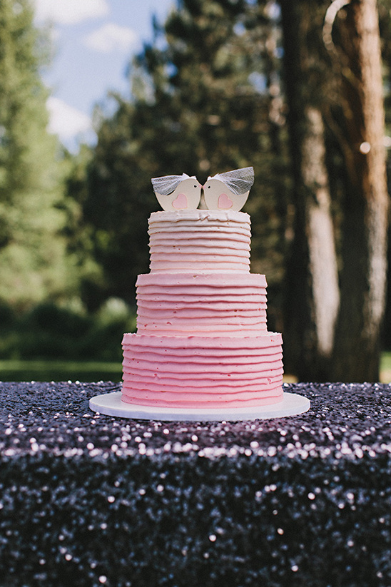 love bird topped pink ombre wedding cake