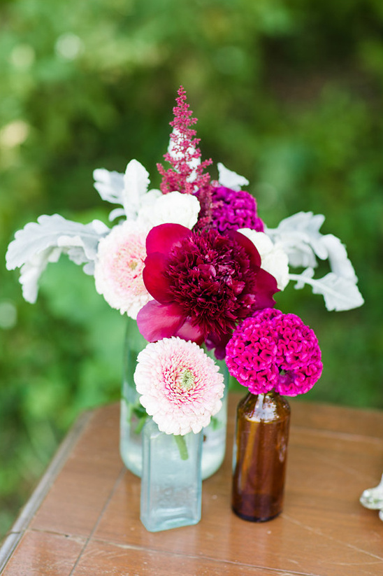 crimson and pink flower arrangement