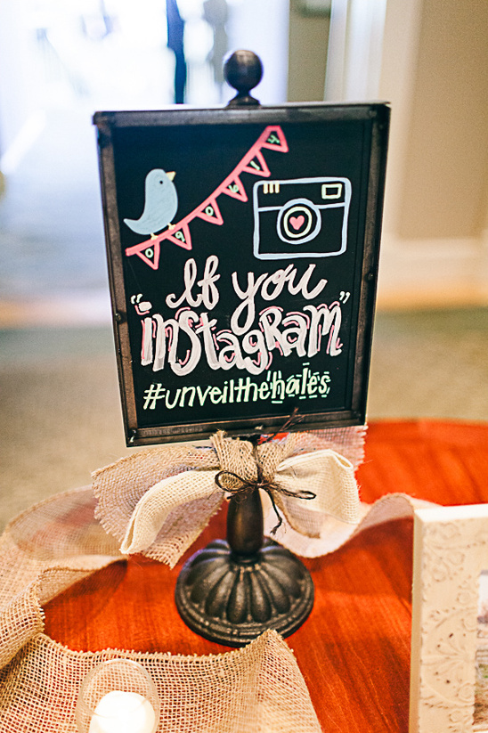 Chalkboard sign encourages Instagram photos at a wedding reception