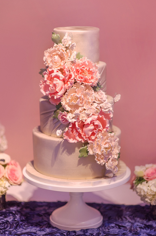 wedding cake with pink floral cascade @weddingchicks