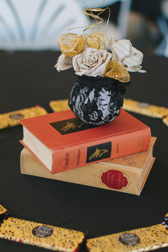 gold lace and book centerpiece @weddingchicks