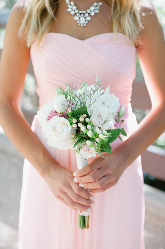 white bouquet that pops against pink bridesmaid dress