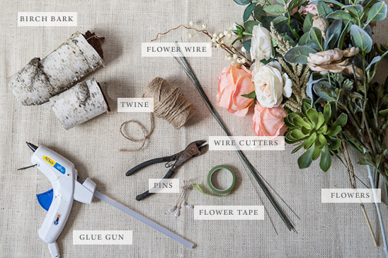 DIY floral arrangement supplies: birch bark, glue gun, flowers, wire