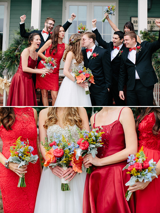 Happy bridal party in red dresses celebrating a wedding