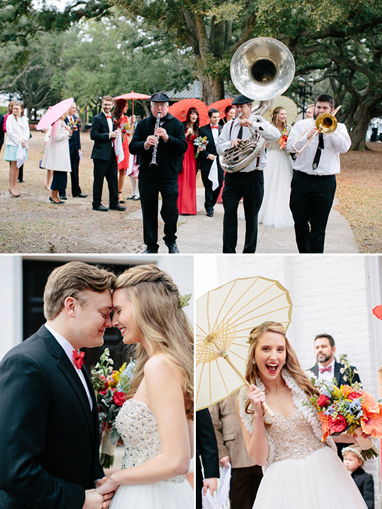 Joyful bride with parasol celebrates wedding with brass band