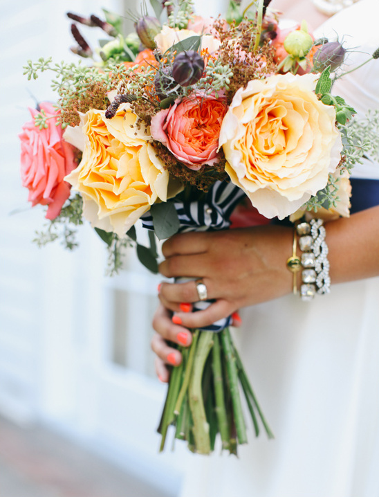 yellow and orange bridal bouquet @weddingchicks