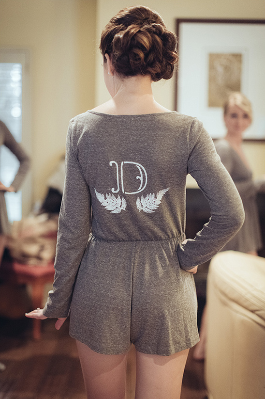 Bride with intricate hairstyle wearing a personalized jumpsuit