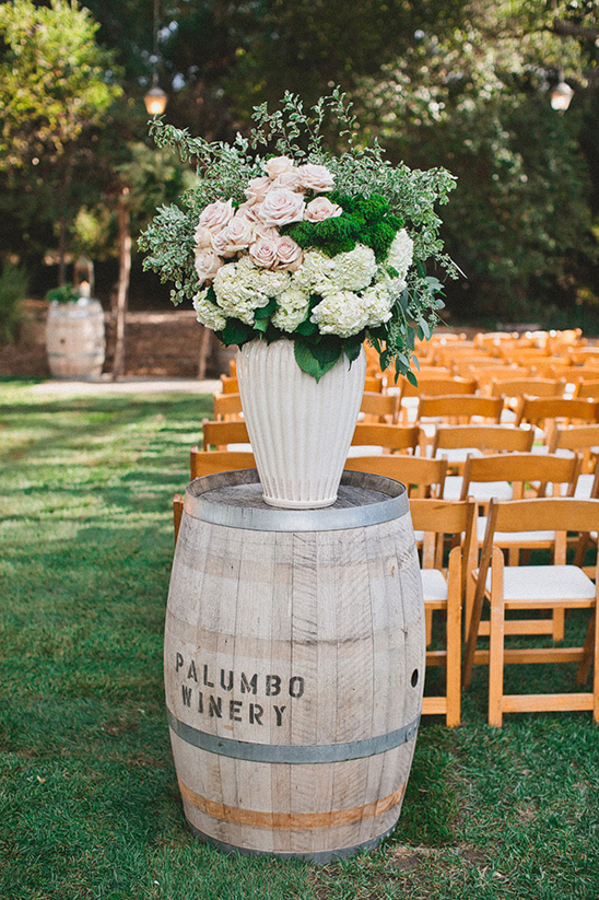 rustic wine barrel flower arrangement @weddingchicks