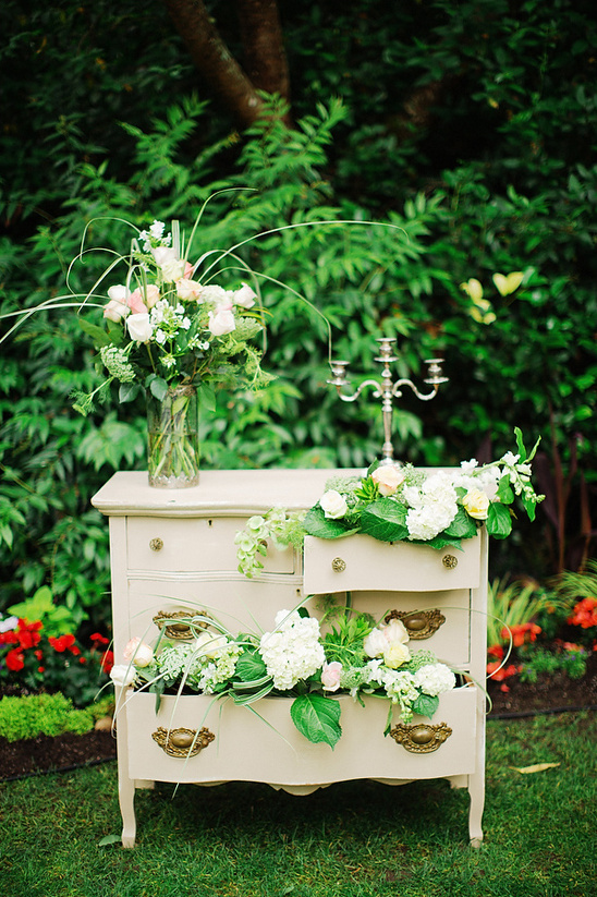 flower accented dresser wedding altar @weddingchicks
