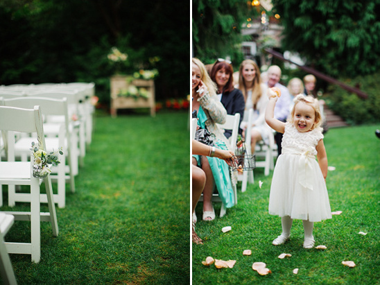 A joyful flower girl celebrating on the lawn during an outdoor wedding