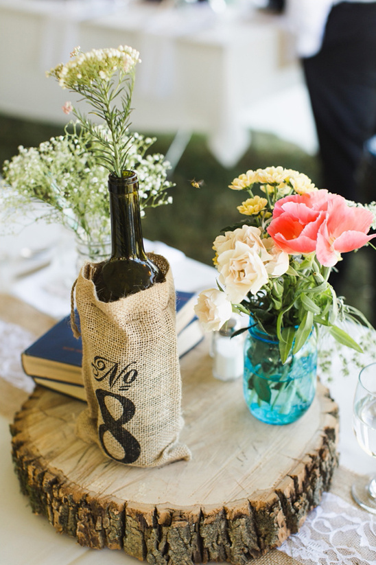 burlap wrapped wine bottle table number @weddingchicks