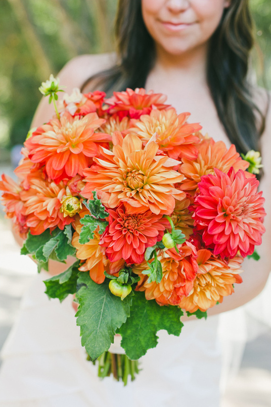 bright orange and red bouquet @weddingchicks