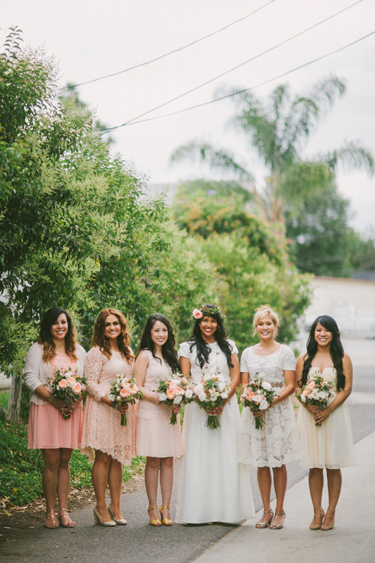 assorted peach and ivory bridesmaid dresses @weddingchicks