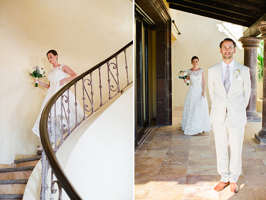 Bride descends stairs towards groom, wedding day anticipation