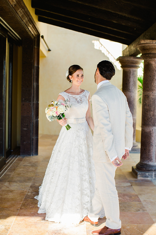 Bride and groom share an intimate moment on wedding day