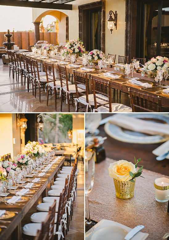 Elegant outdoor dinner table setting with floral centerpieces