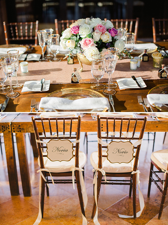 Elegant wedding table setting with floral centerpiece and Novia chairs