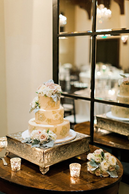 wedding cake with mirror backdrop