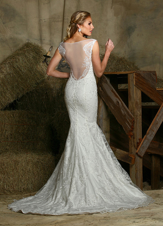Elegant bride in a stunning white lace wedding gown