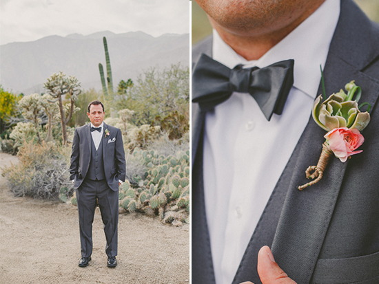 Groom in gray suit with desert backdrop and flower boutonniere