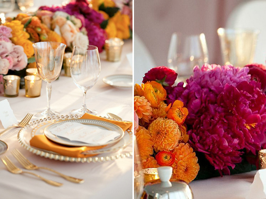 Elegant table setting with vibrant floral arrangement and glassware