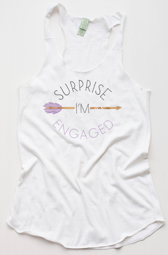 White Surprise I'm Engaged tank top with arrow graphic