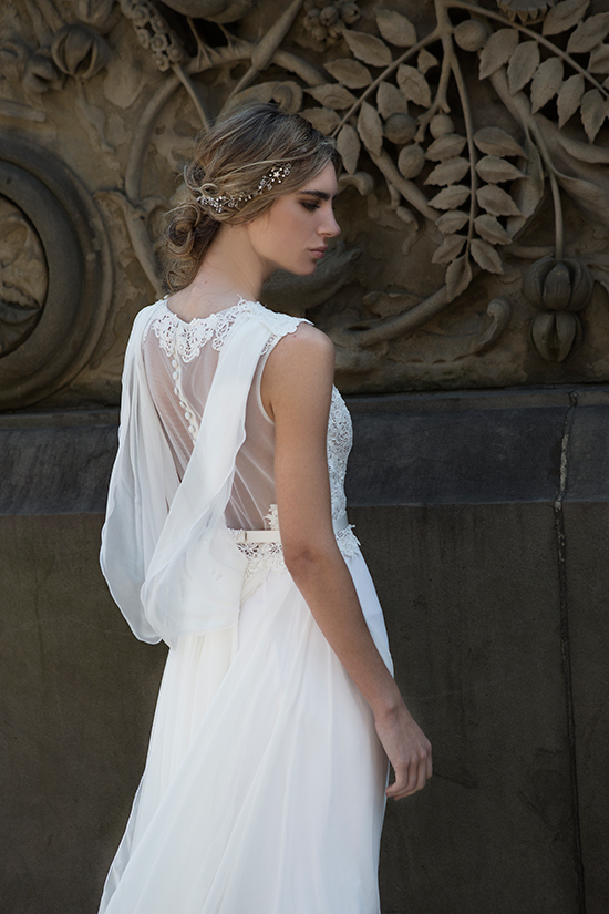 Elegant bride in a beautiful white wedding dress and floral crown