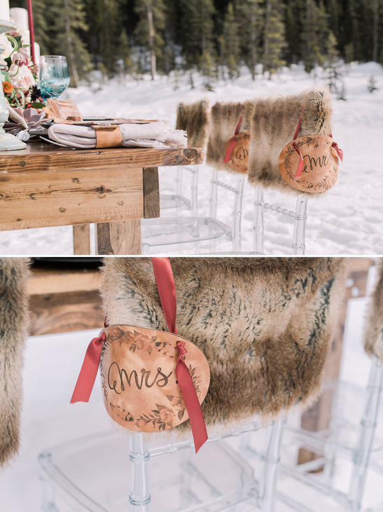 Wedding chairs with fur covers and Mrs sign in winter