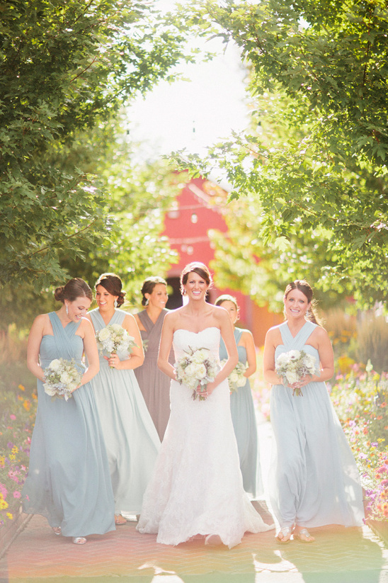 Bride and bridesmaids walking down the aisle, wedding day