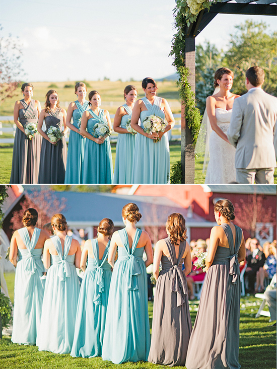 Bridesmaids in teal and grey dresses at outdoor wedding ceremony
