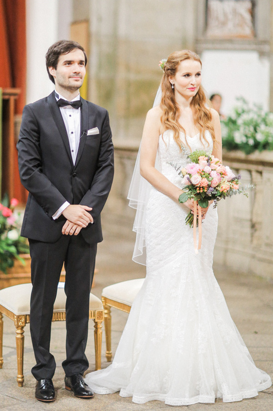 Elegant bride and groom at their wedding ceremony in a church