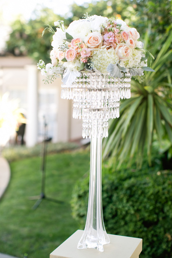 glam flower topped chandeliere @weddingchicks