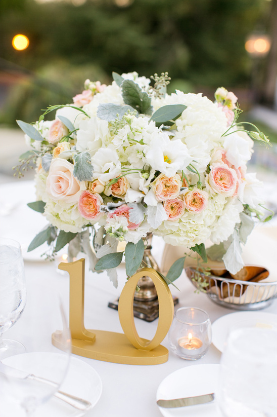 gold table numbers and rose centerpiece @weddingchicks