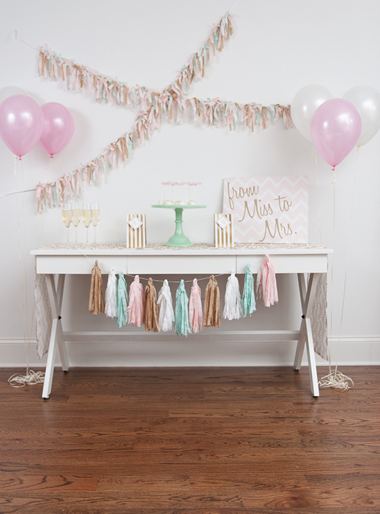 Bridal shower table setting with balloons and decorations