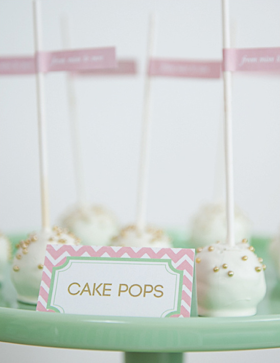 Delicious cake pops decorated for a special occasion on a tray