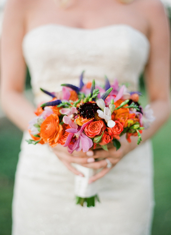 orange and purple bridal bouquet @weddingchicks